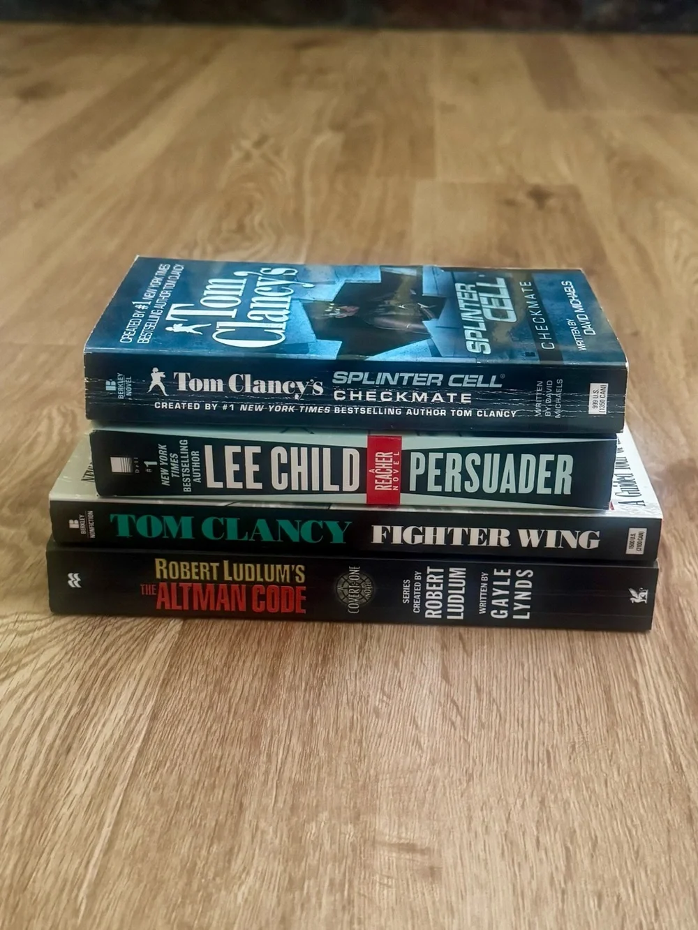 Lot of 4 Tom Clancy, Lee Child, Robert Ludlum Thriller Books